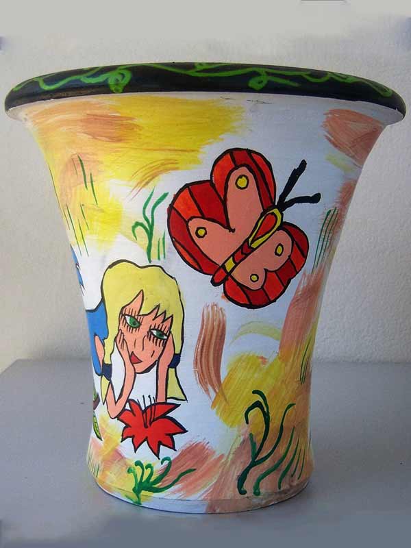 Χειροποίητη Κεραμική Γλάστρα με κορίτσι και πεταλούδα Χειροποίητη Κεραμική Γλάστρα με κορίτσι και πεταλούδα